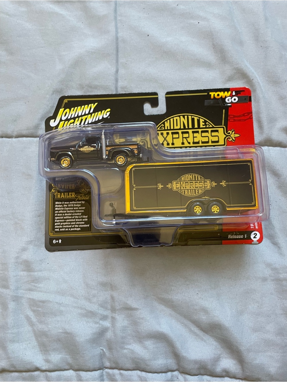 Johnny Lightning Midnight Express Black & Gold Tow Truck and Trailer Set